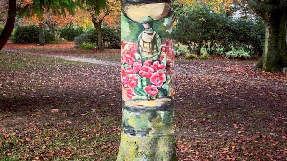 A soldier painted on a tree