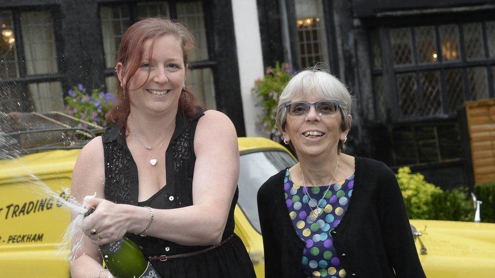 Lottery winners spray champagne