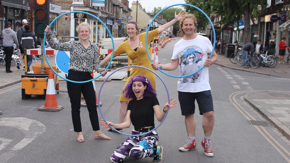 Hula hoopers on Mill Road, Cambridge