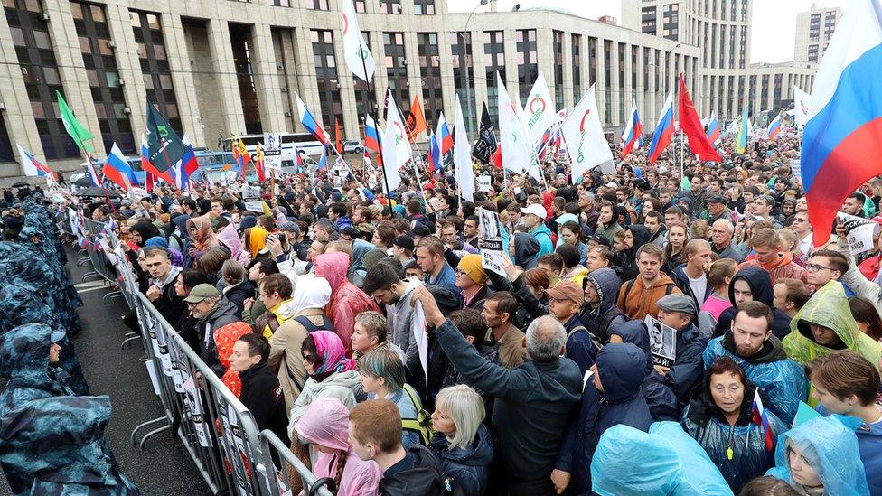 People take part in a rally in support of rejected independent candidates in the Moscow City Duma [Moscow parliament] election, in central Moscow, Russia, 10 August 2019