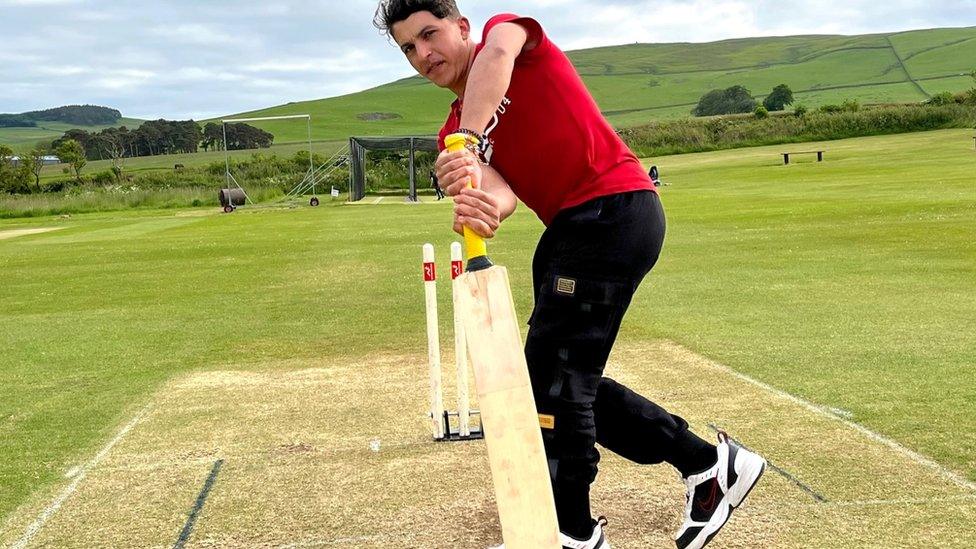 Sadam practices batting at Meigle Park cricket ground