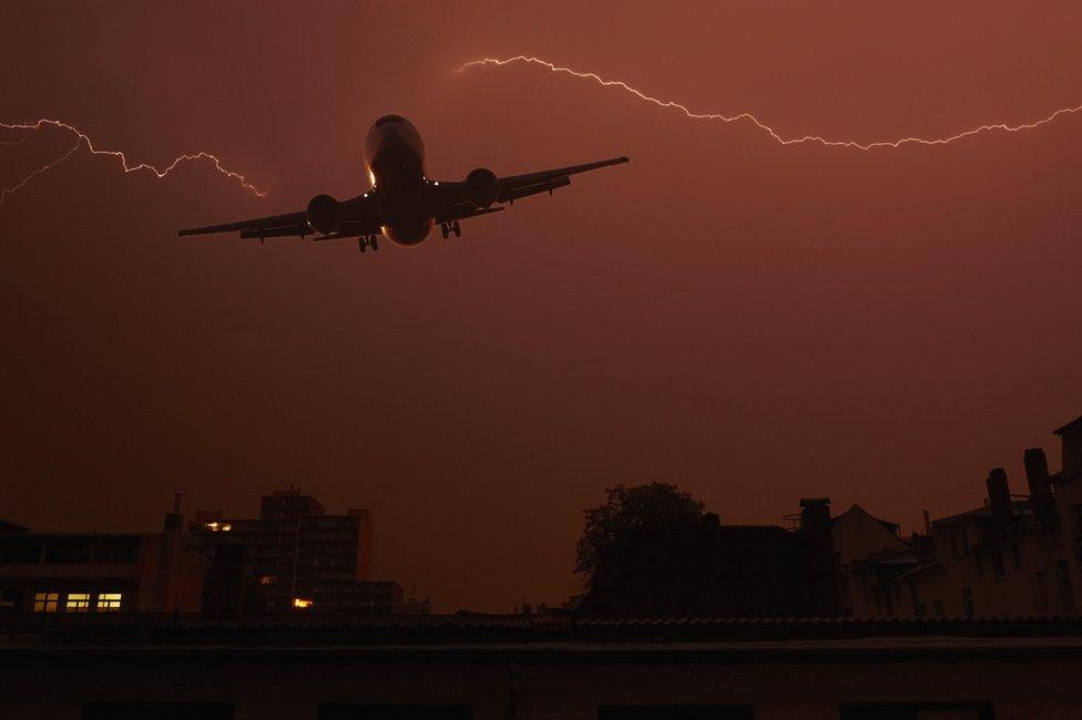 Lightning and a plane