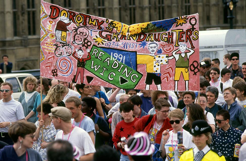 People attend the Pride march in 1991