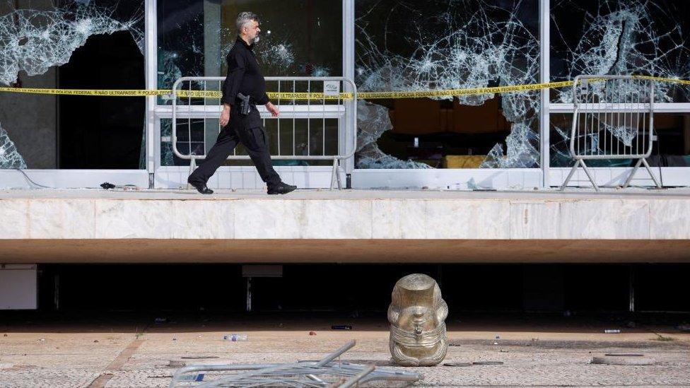 A Lady Justice statue's head is seen on the floor following Brazil's anti-democratic riots, at the Supreme Court building in Brasilia, Brazil, January 10, 2023.