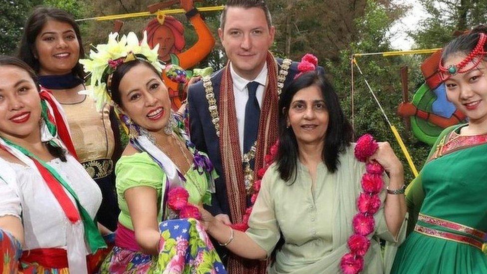 Belfast Lord Mayor John Finucane with Mela performers