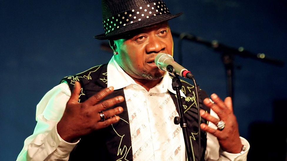 Papa Wemba performs on stage in Paris, in 2006