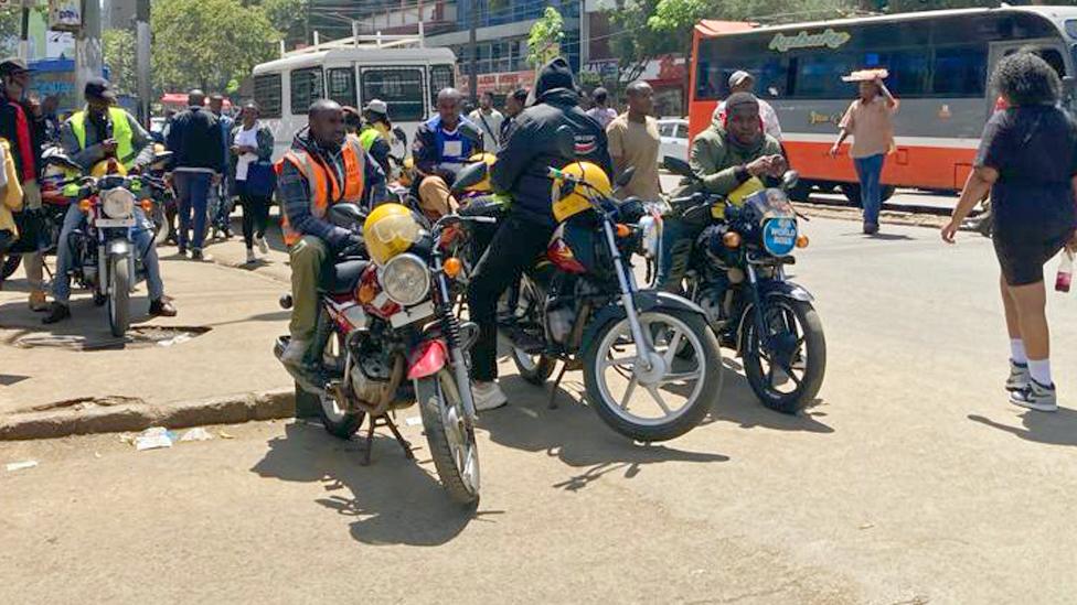 Motorbike taxi riders parked in Nairobi, Kenya