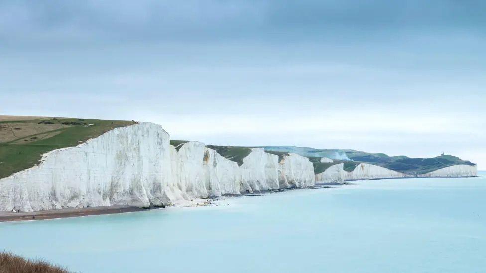 An aerial shot showing white cliffs and sea at Seven Sisters in East Sussex