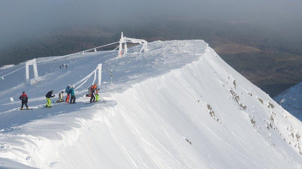 Skiers accessing conditions at the Back Corries at Nevis Range