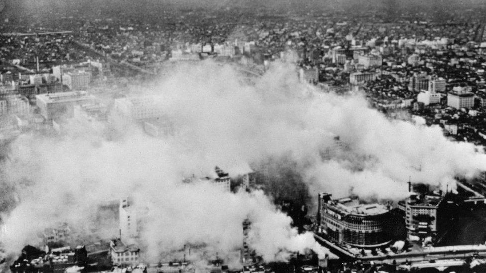 Smoke rises from the city of Tokyo during an American air-raid, Japan, June 1944