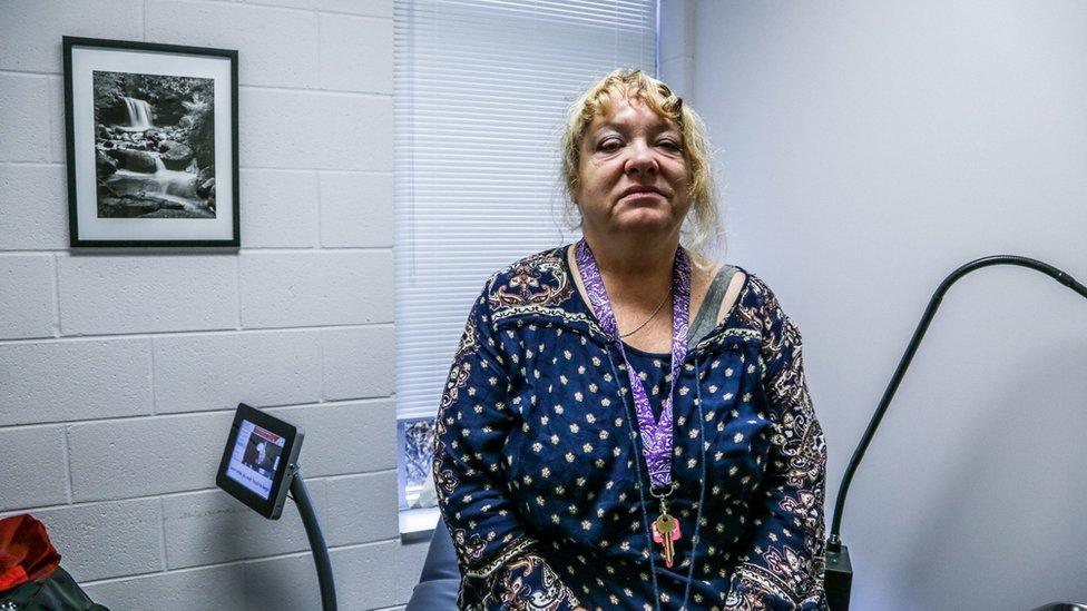 Patient sits on table