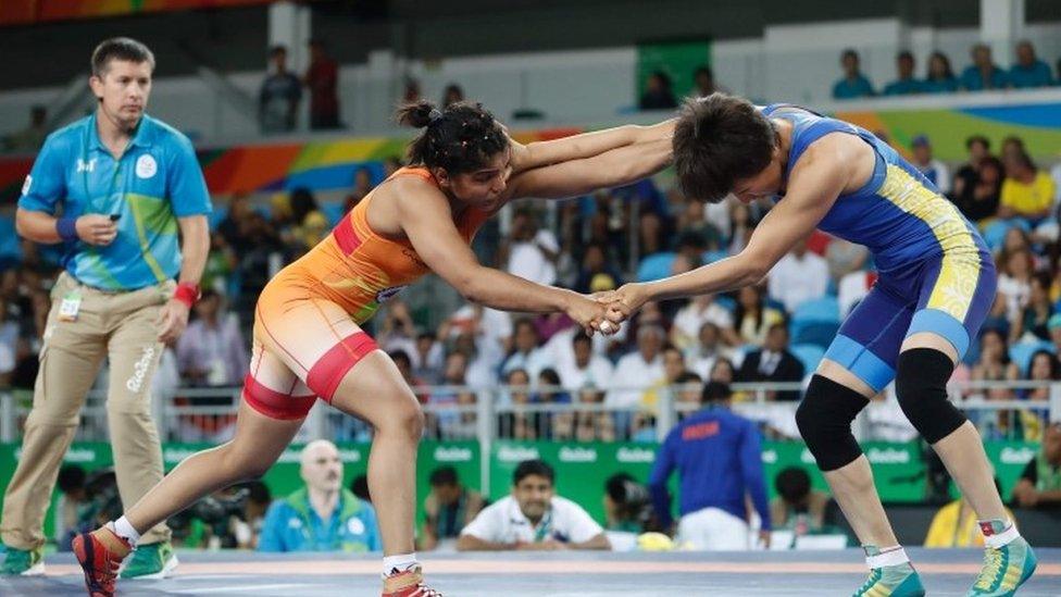 India"s Sakshi Malik (red) wrestles with Kirghyzstan"s Aisuluu Tynybekova in their women"s 58kg freestyle bronze medal match on August 17, 2016