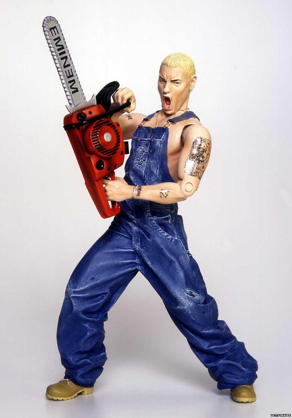 Eminem doll holding a chainsaw