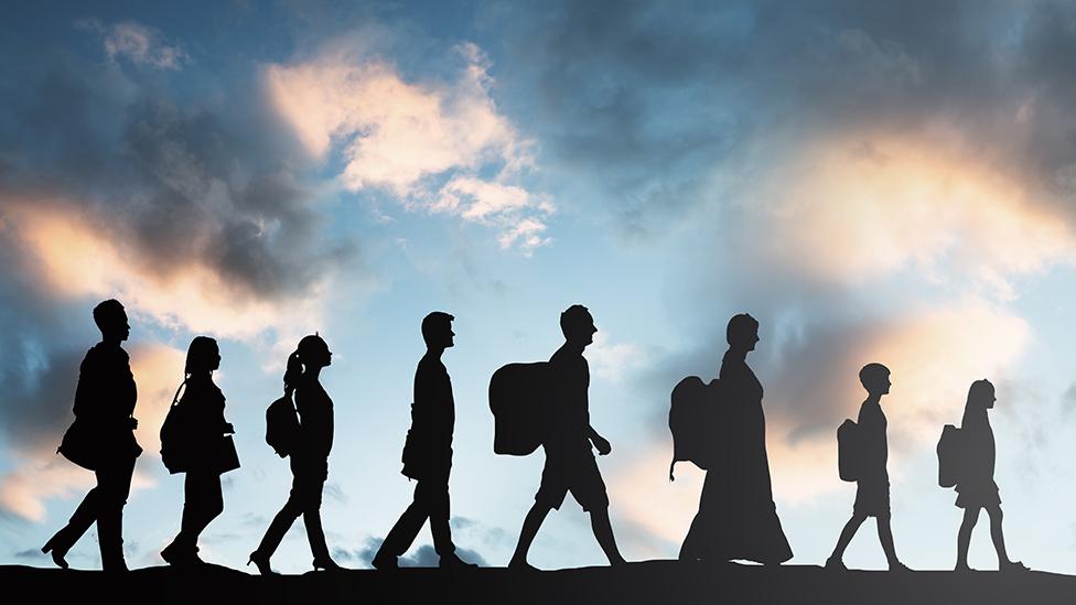 People walking in a line