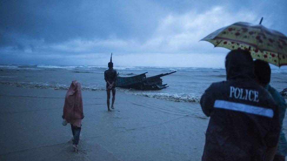 Police and local residents look at the boat where Rohingya refugees were found dead near Cox's Bazar, Bangladesh. Photo: 28 September 2017