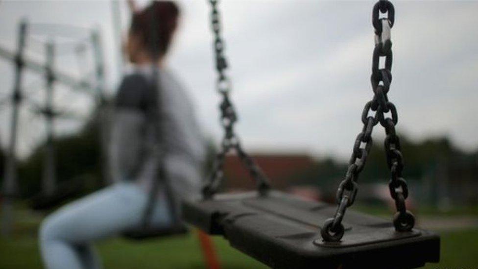 Girl on swing