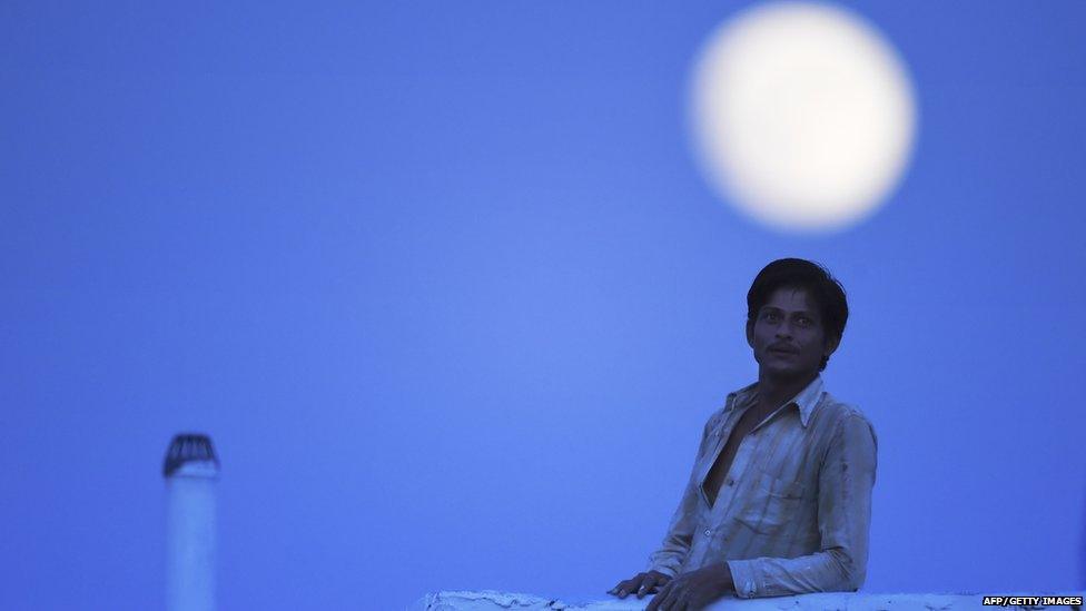 Man with Moon in Background