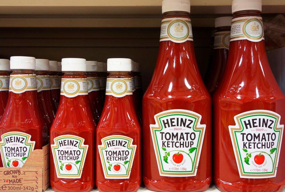 Big and small Heinz tomato ketchup bottles