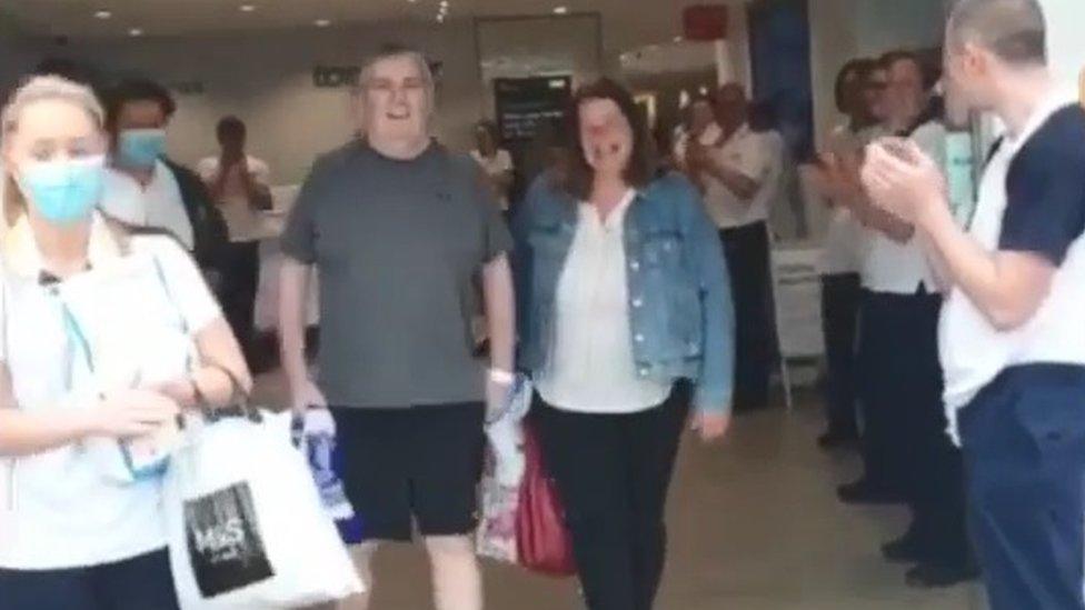 Gerard Small leaving hospital with his wife Lynn