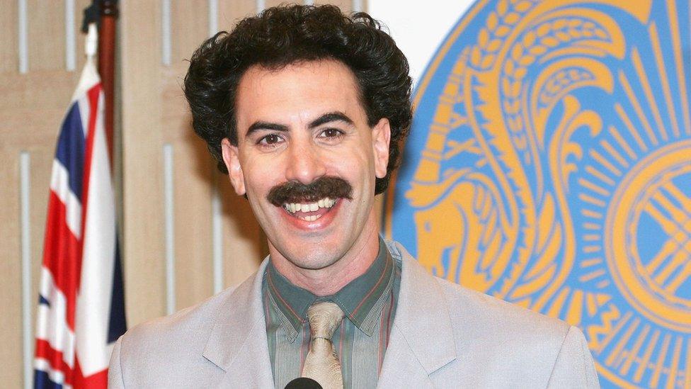 Actor Sacha Baron Cohen appears in character as Kazakh journalist Borat Sagdiyev at a press conference