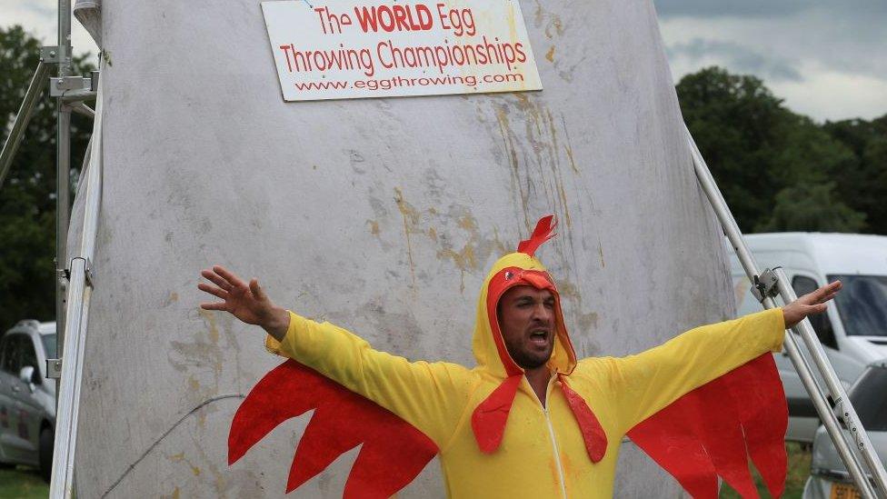 Joel Hicks in a chicken costume