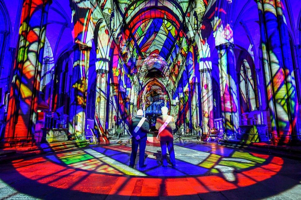 Ushers admire the interior of Salisbury Cathedral, 18 February 2020.