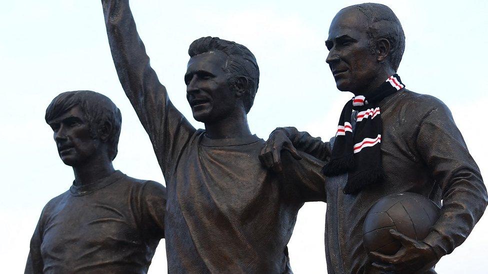 The statue of the United Trinity at Old Trafford - George Best, Denis Law and Bobby Charlton