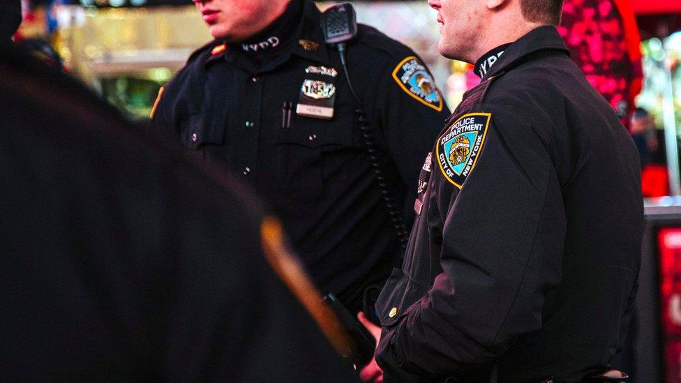 New York City Police Department (NYPD) officers stand guard at a busy street in New York City, New york, USA, 07 November 2016.