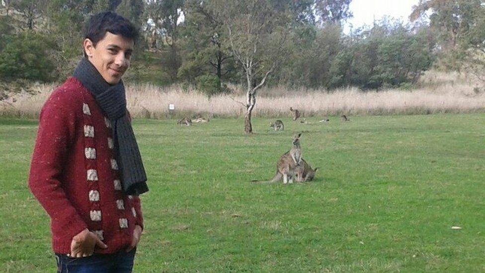 Saad with a kangaroo, after arriving in Australia