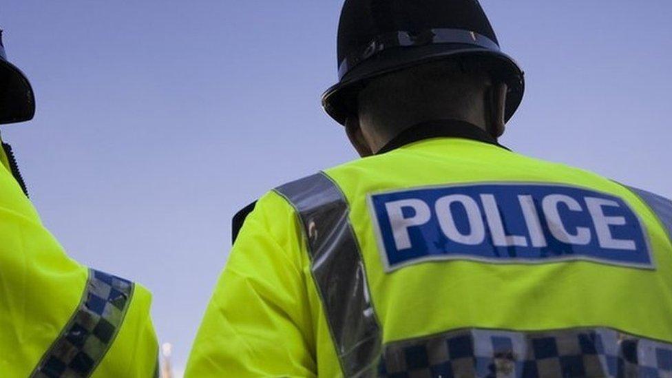 Stock image of two UK police officers