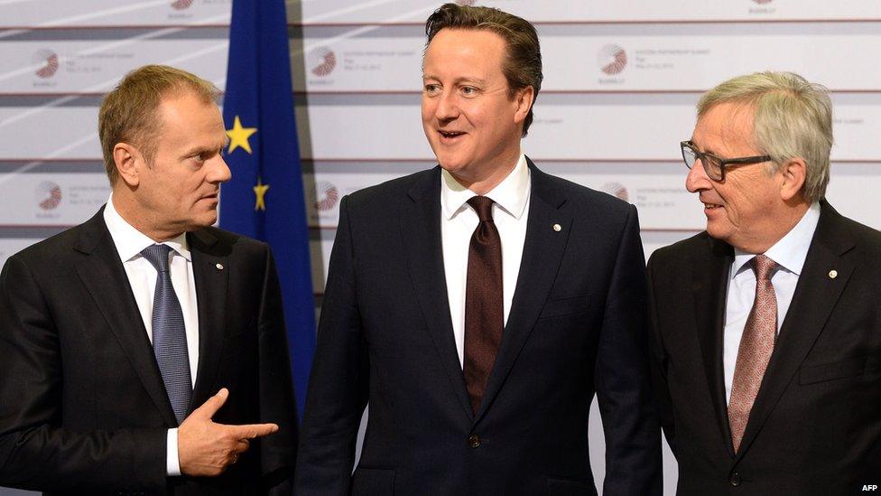 UK Prime Minister David Cameron (C) with President of the European Council Donald Tusk (L) and European Commission President Jean-Claude Juncker