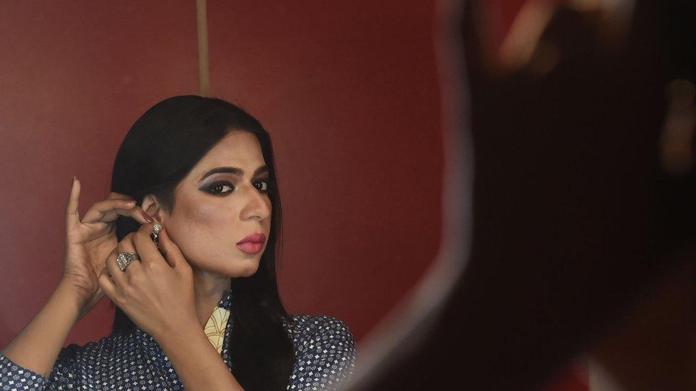 Pakistan's first transgender news anchor, Marvia Malik, prepares before going live to read the news for the private channel Kohenoor in Lahore, 27 March 2018