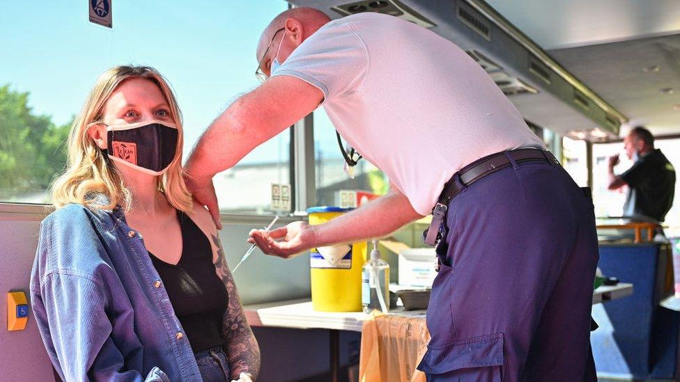 A woman getting a jab in Glasgow, Scotland