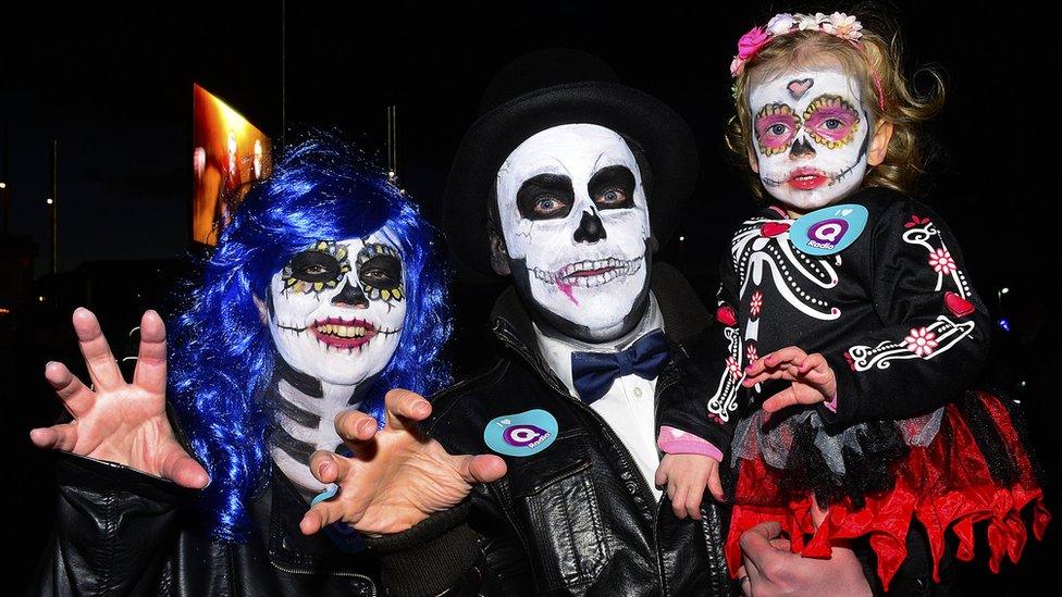 A family in costumes at the Halloween Monster Mash in Belfast