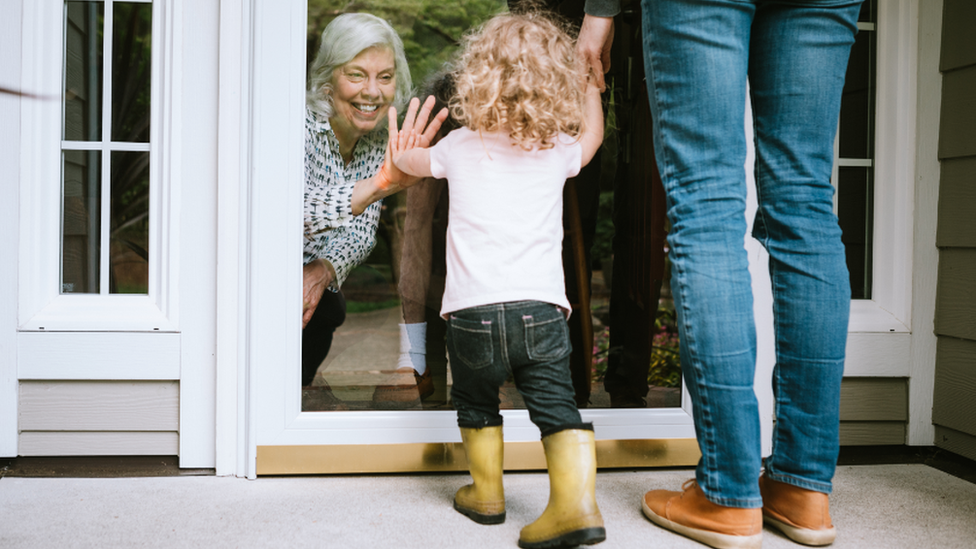 Seeing child through a door