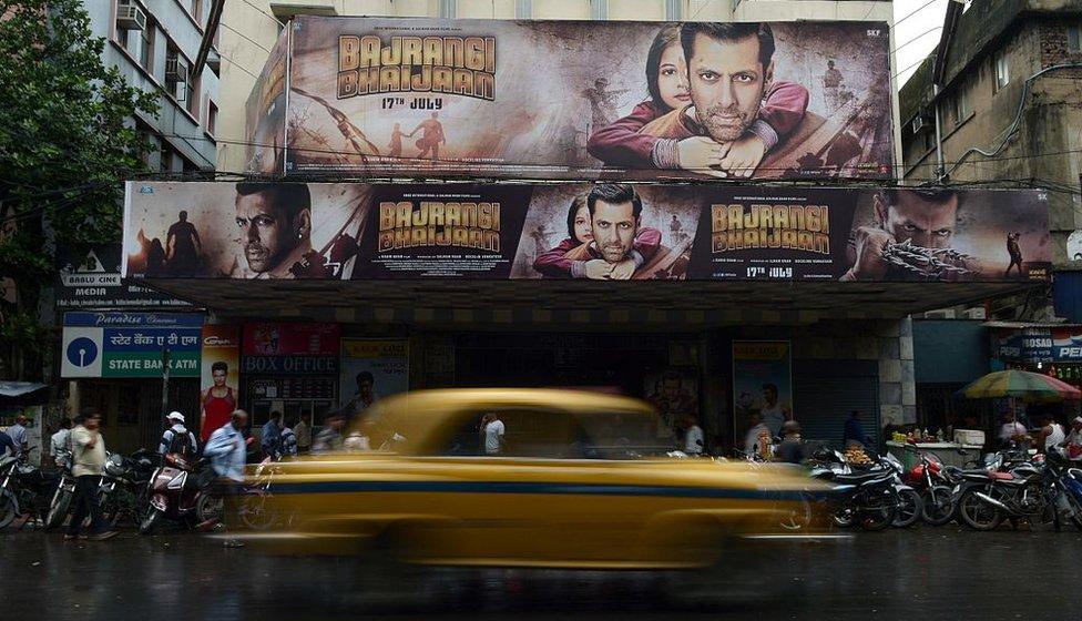 Posters for recently-released film 'Bajrangi Bhaijaan' staring Bollywood actor Salman Khan are seen in Kolkata on July 27, 2015. Khan retracted comments urging India's top court on July 26 to spare the life of a convicted bomb plotter due to be hanged this week, after his appeal sparked uproar