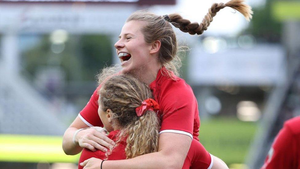 Abby Dow celebrating after a try