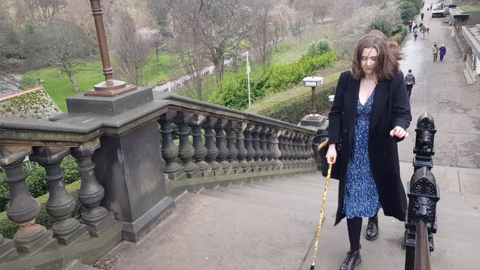 Ellen Blunsdon using her walking stick