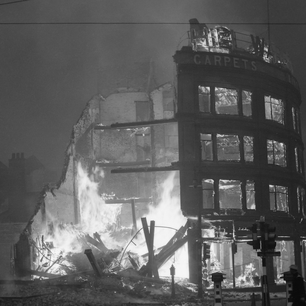 Burning buildings in Manchester after a German air raid