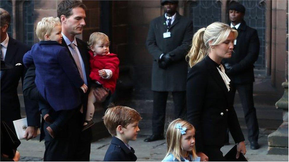 Lady Edwina Grosvenor and her family arrive at the service