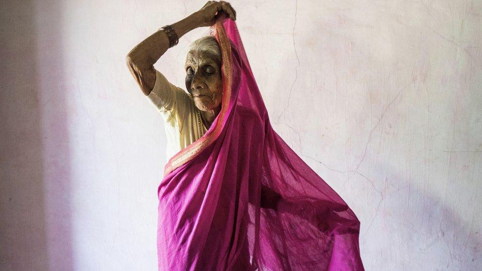 Ansuya Deshmukh putting on sari