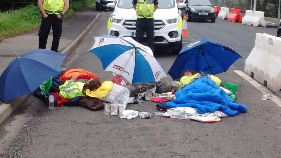 Protesters in road