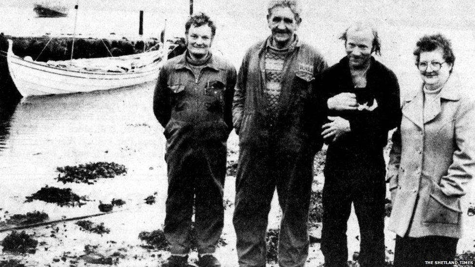 Coxswain Wilbert Clark, James Manson, Ove Joensen and his cat Jessica, and Carrie Manson pictured in Shetland in 1984