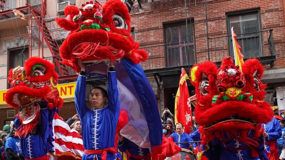 People in Chinatown of Manhattan, New York City celebrate Lunar New Year.