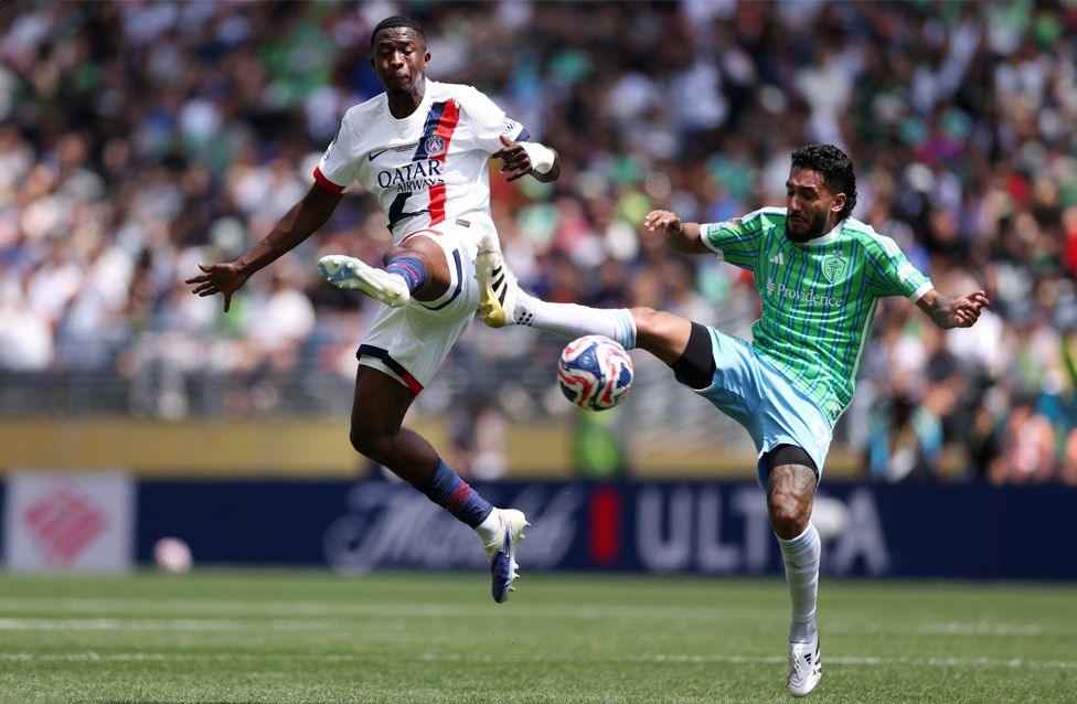 Jesus Ferreira of Seattle Sounders challenges Willian Pacho of Paris Saint-Germain during the FIFA Club World Cup in Seattle, Washington. Photo by Justin Setterfield