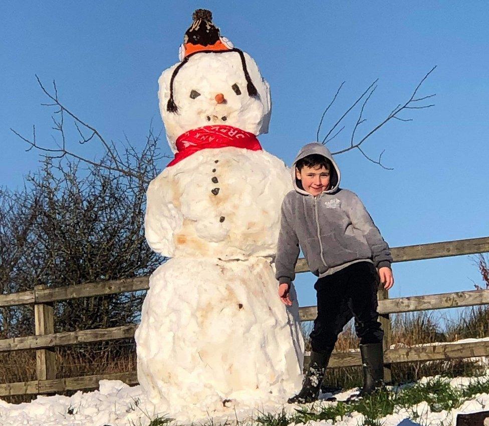 Ben McGovern in Garrison with his snowman