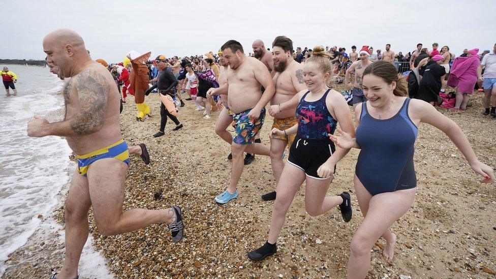 Gosport swimmers in fancy dress on New Year's Day