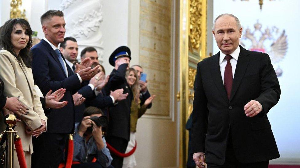 Russian President Vladimir Putin walks before his inauguration ceremony at the Kremlin in Moscow, Russia May 7, 2024