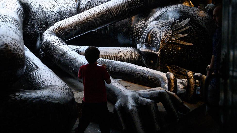 A giant by artist Phlegm