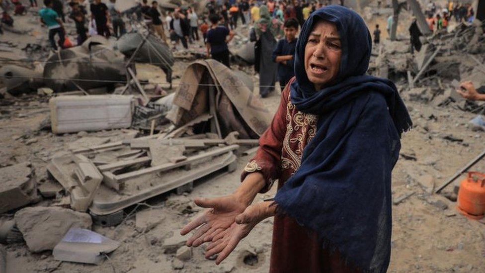 Effects of the destruction caused by an Israeli bomb east of Khan Younis in the southern Gaza Strip on 12 November